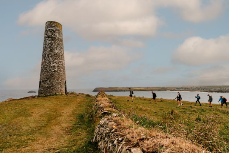 Walkers on a Cornish cliff top