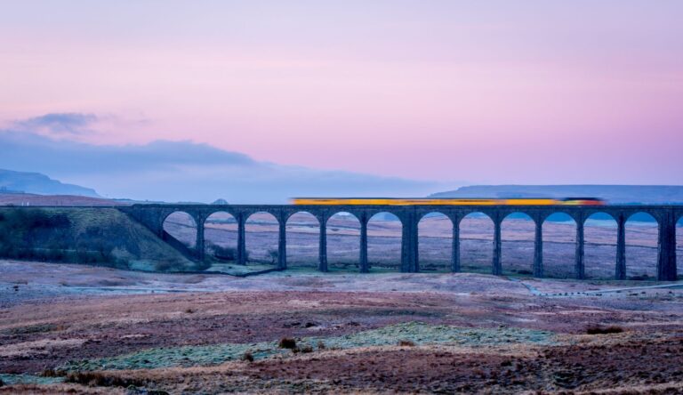 Train speeding over the viaduct