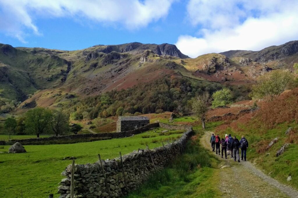 Walkers approach an ascent in the Lake District