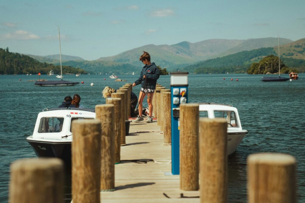 Worker on a pier, Lake Windermere - Lake District