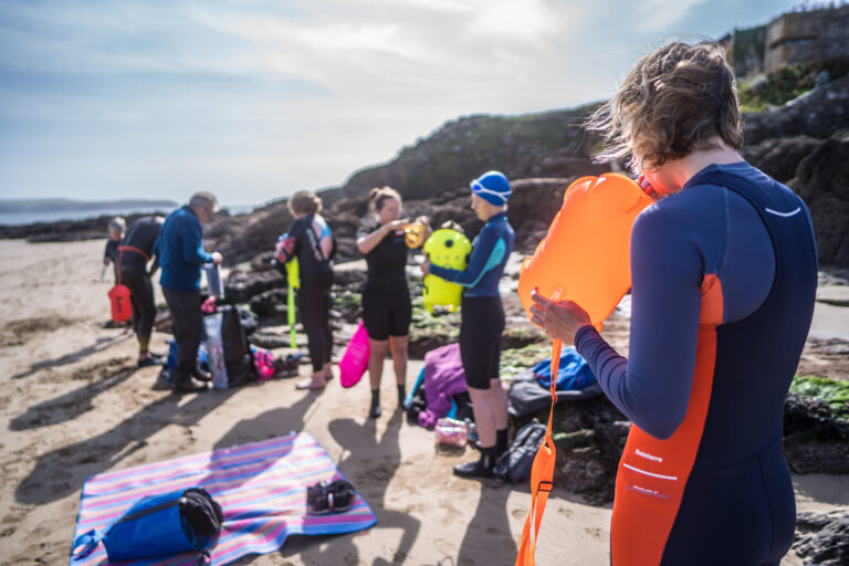 swimmers-getting-equipment-by-the-sea-devon